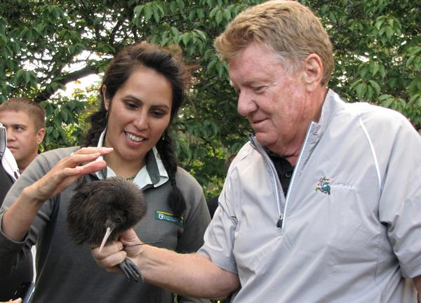 Wairakei Golf +Sanctuary owner Gary Lane and Kiwi ranger Renee Potae pictured with Funky - one of two kiwi chicks released on to the sanctuary this month.